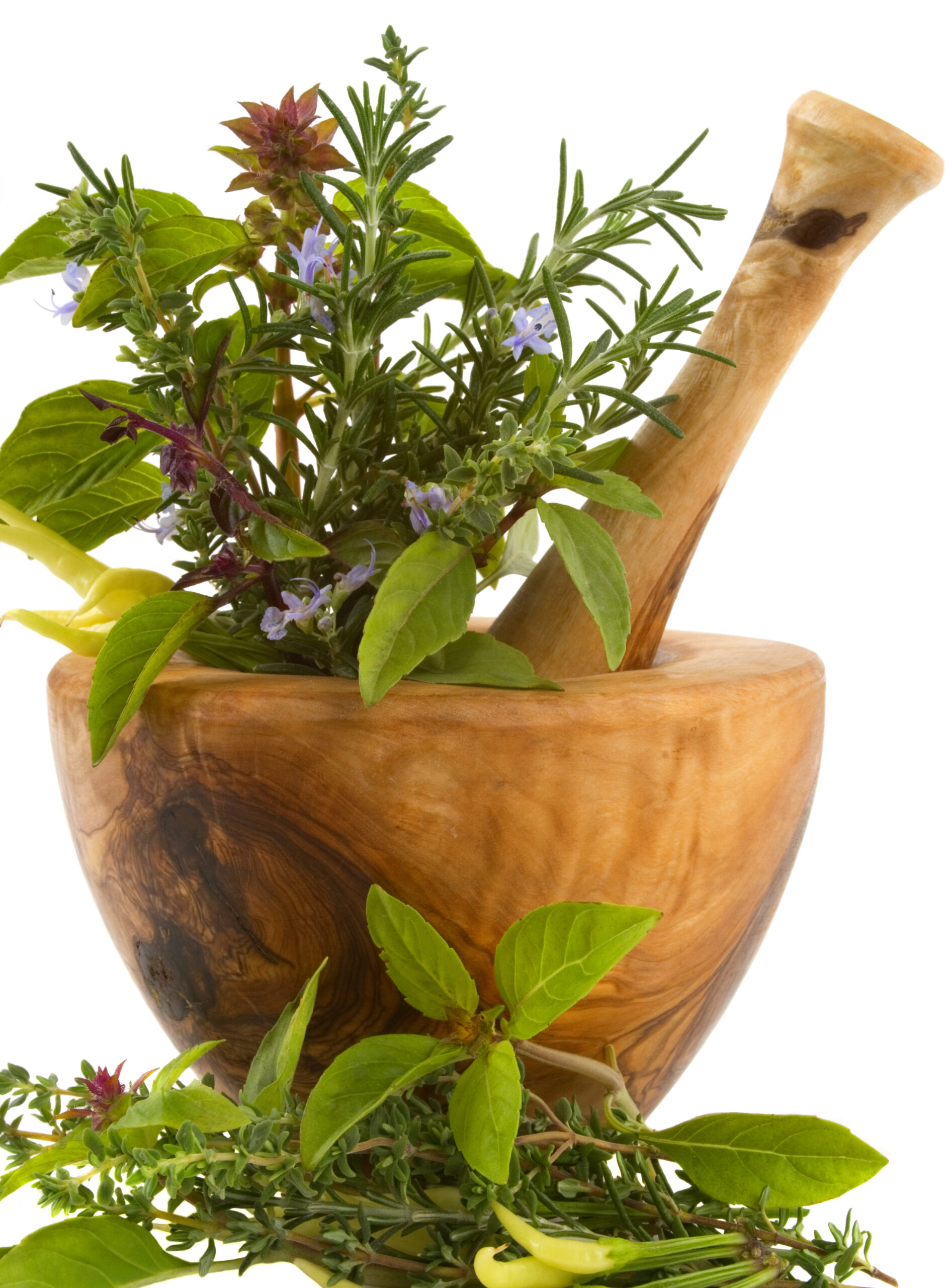 herbs in a mortar and pestle